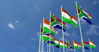 Niger and South Africa Flags Waving Together in the Sky, Seamless Loop in Wind, Space on Left Side for Design or Information, 3D Rendering video