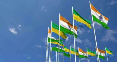 Gabon and India Flags Waving Together in the Sky, Seamless Loop in Wind, Space on Left Side for Design or Information, 3D Rendering video