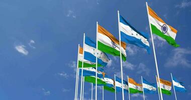 Honduras and India Flags Waving Together in the Sky, Seamless Loop in Wind, Space on Left Side for Design or Information, 3D Rendering video