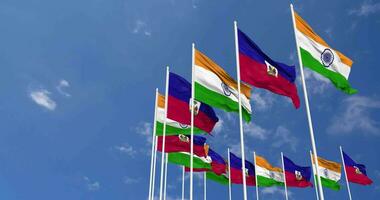 Haiti and India Flags Waving Together in the Sky, Seamless Loop in Wind, Space on Left Side for Design or Information, 3D Rendering video