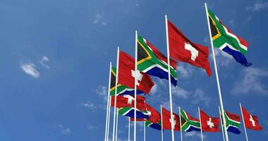 Switzerland and South Africa Flags Waving Together in the Sky, Seamless Loop in Wind, Space on Left Side for Design or Information, 3D Rendering video