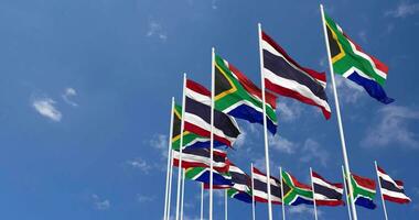 Thailand and South Africa Flags Waving Together in the Sky, Seamless Loop in Wind, Space on Left Side for Design or Information, 3D Rendering video