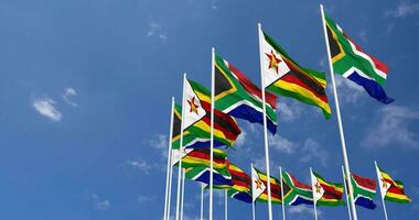 Zimbabwe and South Africa Flags Waving Together in the Sky, Seamless Loop in Wind, Space on Left Side for Design or Information, 3D Rendering video