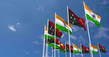 Papua New Guinea and India Flags Waving Together in the Sky, Seamless Loop in Wind, Space on Left Side for Design or Information, 3D Rendering video