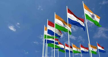 Paraguay and India Flags Waving Together in the Sky, Seamless Loop in Wind, Space on Left Side for Design or Information, 3D Rendering video