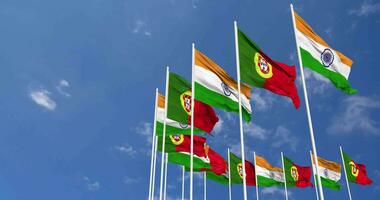 Portugal and India Flags Waving Together in the Sky, Seamless Loop in Wind, Space on Left Side for Design or Information, 3D Rendering video