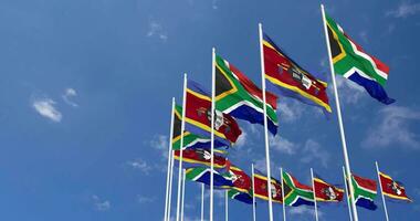 Eswatini and South Africa Flags Waving Together in the Sky, Seamless Loop in Wind, Space on Left Side for Design or Information, 3D Rendering video