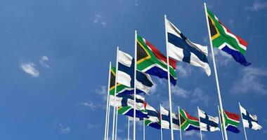 Finland and South Africa Flags Waving Together in the Sky, Seamless Loop in Wind, Space on Left Side for Design or Information, 3D Rendering video