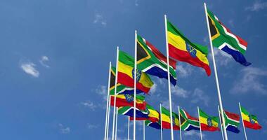 Ethiopia and South Africa Flags Waving Together in the Sky, Seamless Loop in Wind, Space on Left Side for Design or Information, 3D Rendering video