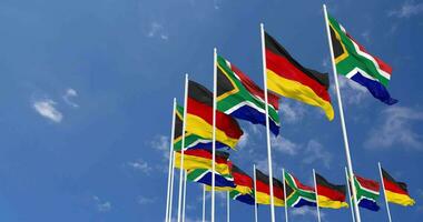 Germany and South Africa Flags Waving Together in the Sky, Seamless Loop in Wind, Space on Left Side for Design or Information, 3D Rendering video