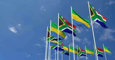 Gabon and South Africa Flags Waving Together in the Sky, Seamless Loop in Wind, Space on Left Side for Design or Information, 3D Rendering video