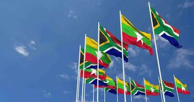 Myanmar, Burma and South Africa Flags Waving Together in the Sky, Seamless Loop in Wind, Space on Left Side for Design or Information, 3D Rendering video