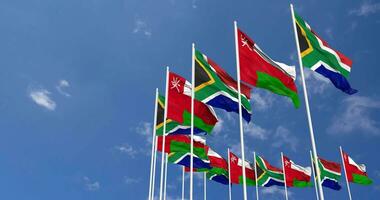 Oman and South Africa Flags Waving Together in the Sky, Seamless Loop in Wind, Space on Left Side for Design or Information, 3D Rendering video