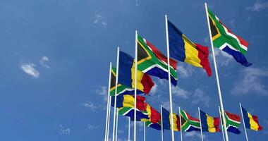 Romania and South Africa Flags Waving Together in the Sky, Seamless Loop in Wind, Space on Left Side for Design or Information, 3D Rendering video