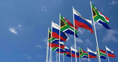 Russia and South Africa Flags Waving Together in the Sky, Seamless Loop in Wind, Space on Left Side for Design or Information, 3D Rendering video