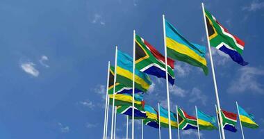 Ruanda und Süd Afrika Flaggen winken zusammen im das Himmel, nahtlos Schleife im Wind, Raum auf links Seite zum Design oder Information, 3d Rendern video