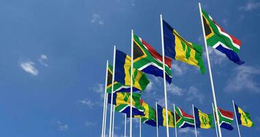 Saint Vincent and the Grenadines and South Africa Flags Waving Together in the Sky, Seamless Loop in Wind, Space on Left Side for Design or Information, 3D Rendering video