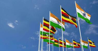 Uganda und Indien Flagge winken zusammen im das Himmel, nahtlos Schleife im Wind, Raum auf links Seite zum Design oder Information, 3d Rendern video