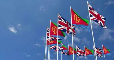 eritreia e Unidos reino bandeiras acenando juntos dentro a céu, desatado ciclo dentro vento, espaço em esquerda lado para Projeto ou Informação, 3d Renderização video