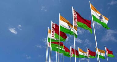 Belarus and India Flags Waving Together in the Sky, Seamless Loop in Wind, Space on Left Side for Design or Information, 3D Rendering video