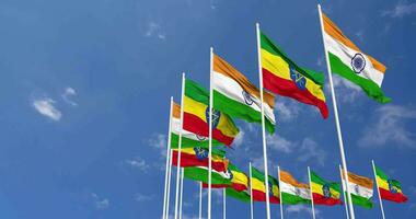 Ethiopia and India Flags Waving Together in the Sky, Seamless Loop in Wind, Space on Left Side for Design or Information, 3D Rendering video