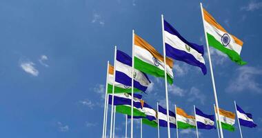 El Salvador and India Flags Waving Together in the Sky, Seamless Loop in Wind, Space on Left Side for Design or Information, 3D Rendering video