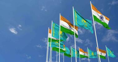 Kazakhstan and India Flags Waving Together in the Sky, Seamless Loop in Wind, Space on Left Side for Design or Information, 3D Rendering video