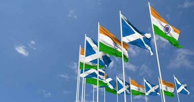 Scotland and India Flag Waving Together in the Sky, Seamless Loop in Wind, Space on Left Side for Design or Information, 3D Rendering video