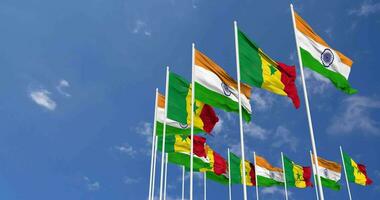 Senegal e Índia bandeira acenando juntos dentro a céu, desatado ciclo dentro vento, espaço em esquerda lado para Projeto ou Informação, 3d Renderização video