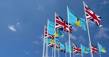 Saint Lucia and United Kingdom Flags Waving Together in the Sky, Seamless Loop in Wind, Space on Left Side for Design or Information, 3D Rendering video