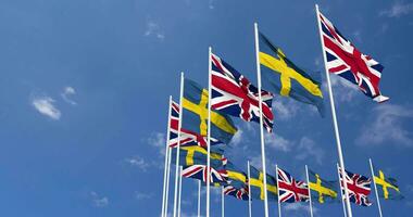 Sweden and United Kingdom Flags Waving Together in the Sky, Seamless Loop in Wind, Space on Left Side for Design or Information, 3D Rendering video