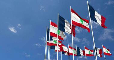 Lebanon and France Flags Waving Together in the Sky, Seamless Loop in Wind, Space on Left Side for Design or Information, 3D Rendering video
