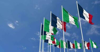 Nigeria and France Flags Waving Together in the Sky, Seamless Loop in Wind, Space on Left Side for Design or Information, 3D Rendering video