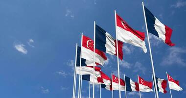 Singapore and France Flags Waving Together in the Sky, Seamless Loop in Wind, Space on Left Side for Design or Information, 3D Rendering video