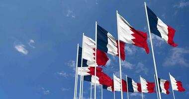 Bahrain and France Flags Waving Together in the Sky, Seamless Loop in Wind, Space on Left Side for Design or Information, 3D Rendering video