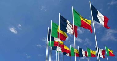 Benin and France Flags Waving Together in the Sky, Seamless Loop in Wind, Space on Left Side for Design or Information, 3D Rendering video