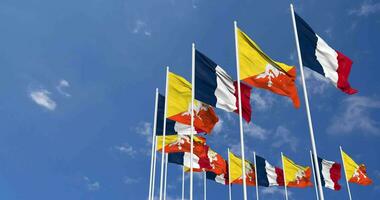 Bhutan and France Flags Waving Together in the Sky, Seamless Loop in Wind, Space on Left Side for Design or Information, 3D Rendering video