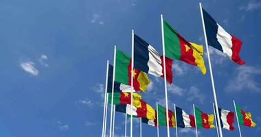 Cameroon and France Flags Waving Together in the Sky, Seamless Loop in Wind, Space on Left Side for Design or Information, 3D Rendering video