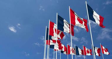 Canada and France Flags Waving Together in the Sky, Seamless Loop in Wind, Space on Left Side for Design or Information, 3D Rendering video