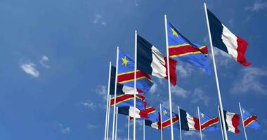 DR Congo and France Flags Waving Together in the Sky, Seamless Loop in Wind, Space on Left Side for Design or Information, 3D Rendering video