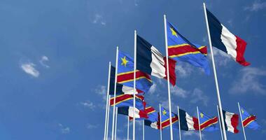 DR Congo and France Flags Waving Together in the Sky, Seamless Loop in Wind, Space on Left Side for Design or Information, 3D Rendering video