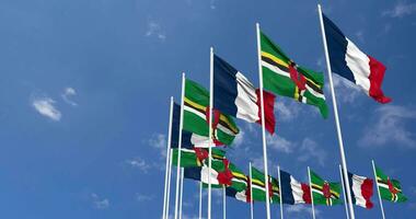 Dominica and France Flags Waving Together in the Sky, Seamless Loop in Wind, Space on Left Side for Design or Information, 3D Rendering video