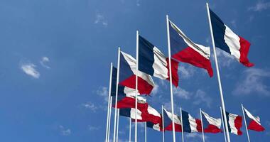 Czech Republic and France Flags Waving Together in the Sky, Seamless Loop in Wind, Space on Left Side for Design or Information, 3D Rendering video