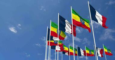 Ethiopia and France Flags Waving Together in the Sky, Seamless Loop in Wind, Space on Left Side for Design or Information, 3D Rendering video