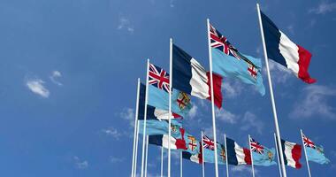 Fiji and France Flags Waving Together in the Sky, Seamless Loop in Wind, Space on Left Side for Design or Information, 3D Rendering video