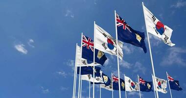 Anguilla and South Korea Flags Waving Together in the Sky, Seamless Loop in Wind, Space on Left Side for Design or Information, 3D Rendering video