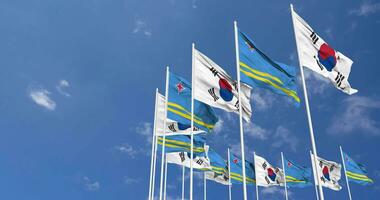 Aruba and South Korea Flags Waving Together in the Sky, Seamless Loop in Wind, Space on Left Side for Design or Information, 3D Rendering video