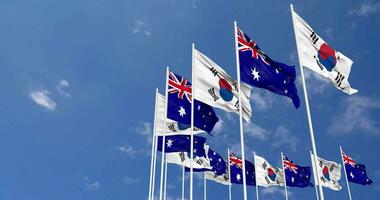 Australia and South Korea Flags Waving Together in the Sky, Seamless Loop in Wind, Space on Left Side for Design or Information, 3D Rendering video