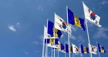 Barbados and South Korea Flags Waving Together in the Sky, Seamless Loop in Wind, Space on Left Side for Design or Information, 3D Rendering video