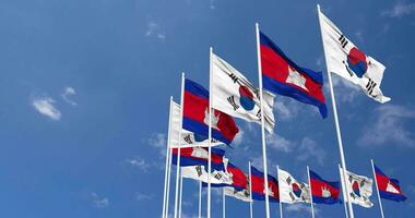 Cambodia and South Korea Flags Waving Together in the Sky, Seamless Loop in Wind, Space on Left Side for Design or Information, 3D Rendering video